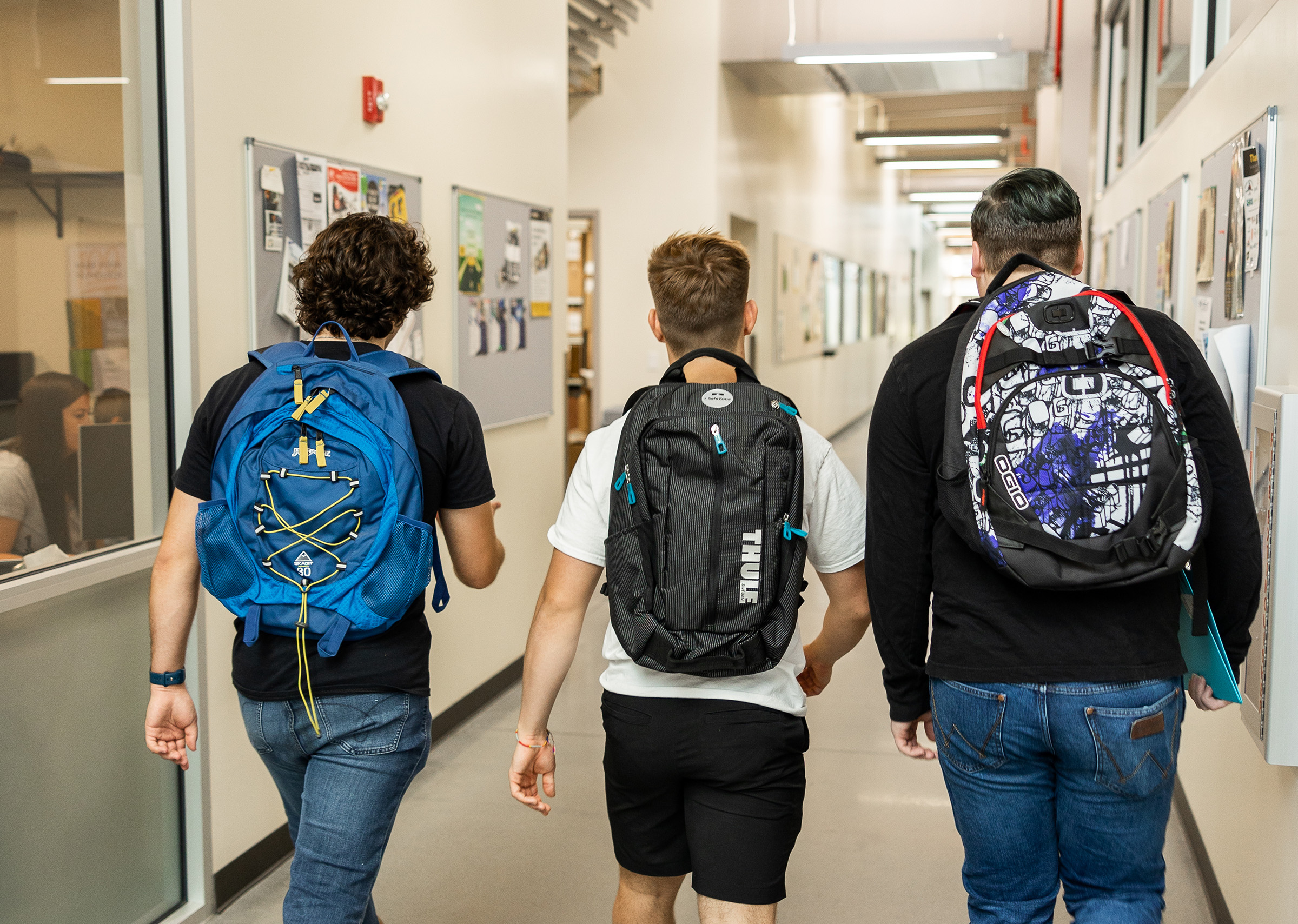 Students walking down a hallway