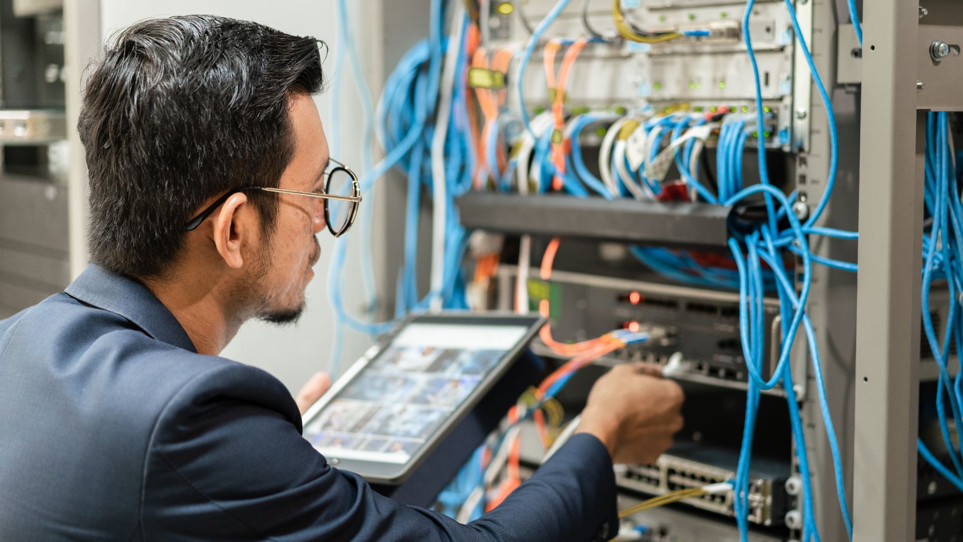 A man testing an electric panel 